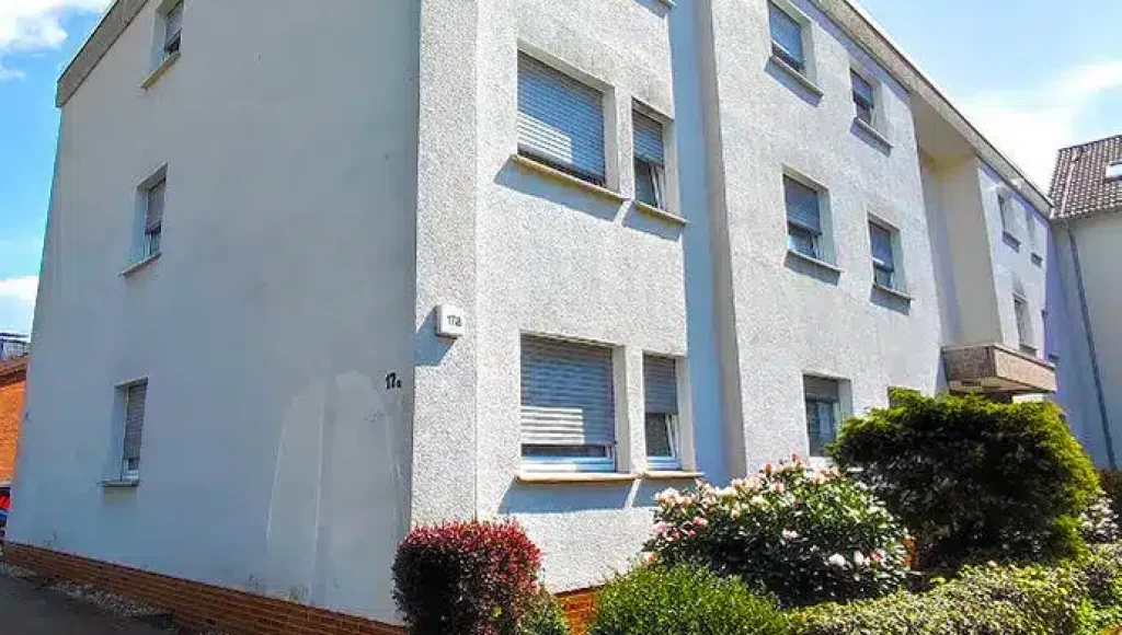 Oppenhome Immobilien - Zwei Wohnungen, ein Preis (Aussenansicht hinten)